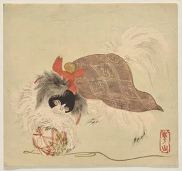 紫のマントを着て絹糸玉で遊ぶ狛犬