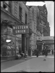 1916年4月28日、ニューヨークシティのW. 125th StreetとSt. Nicholas Avenueにウエスタンユニオンオフィスサイン