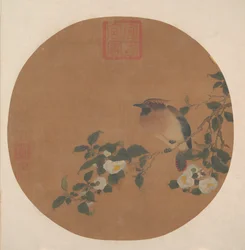 花の咲く木の枝とワクシング科の鳥